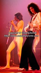 Photo of Freddie Mercury & Brian May of QUEEN performing in Toronto. Photo credit Vincent Banial